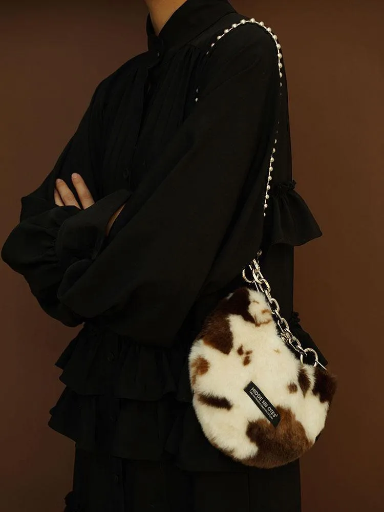 HIDDENNOTES Cow Print Faux Fur Bag